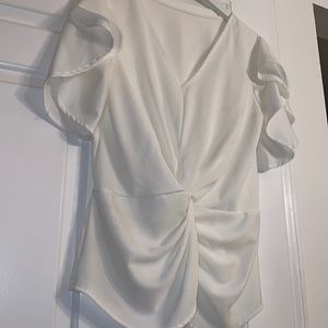 White twist blouse with ruffle sleeve with elastic waist